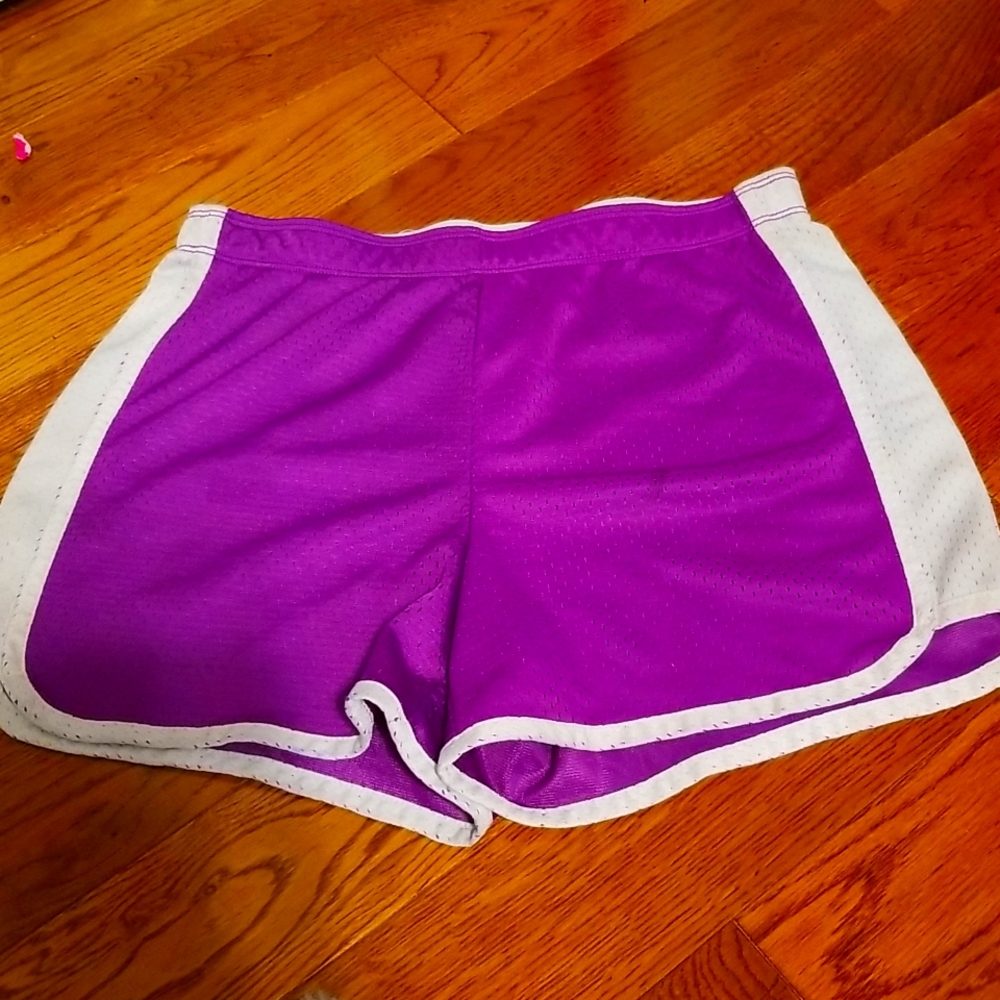 Purple, mesh, breathable shorts. Good for summer days and sports!